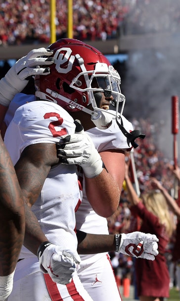 Lamb TDs, defense lift No. 6 OU past 11th-ranked Texas 34-27